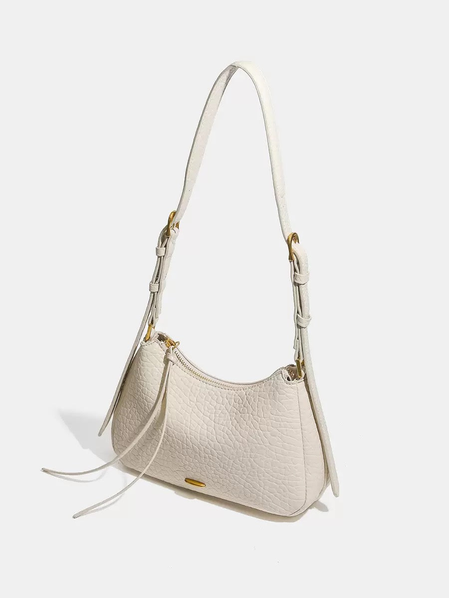 Spring 2026 Relaxed Simple Hobo – The Effortless Petite Underarm Bag  Best for: High-end boutiques or brand websites where a clean, sophisticated look is preferred over keyword-heavy descriptions