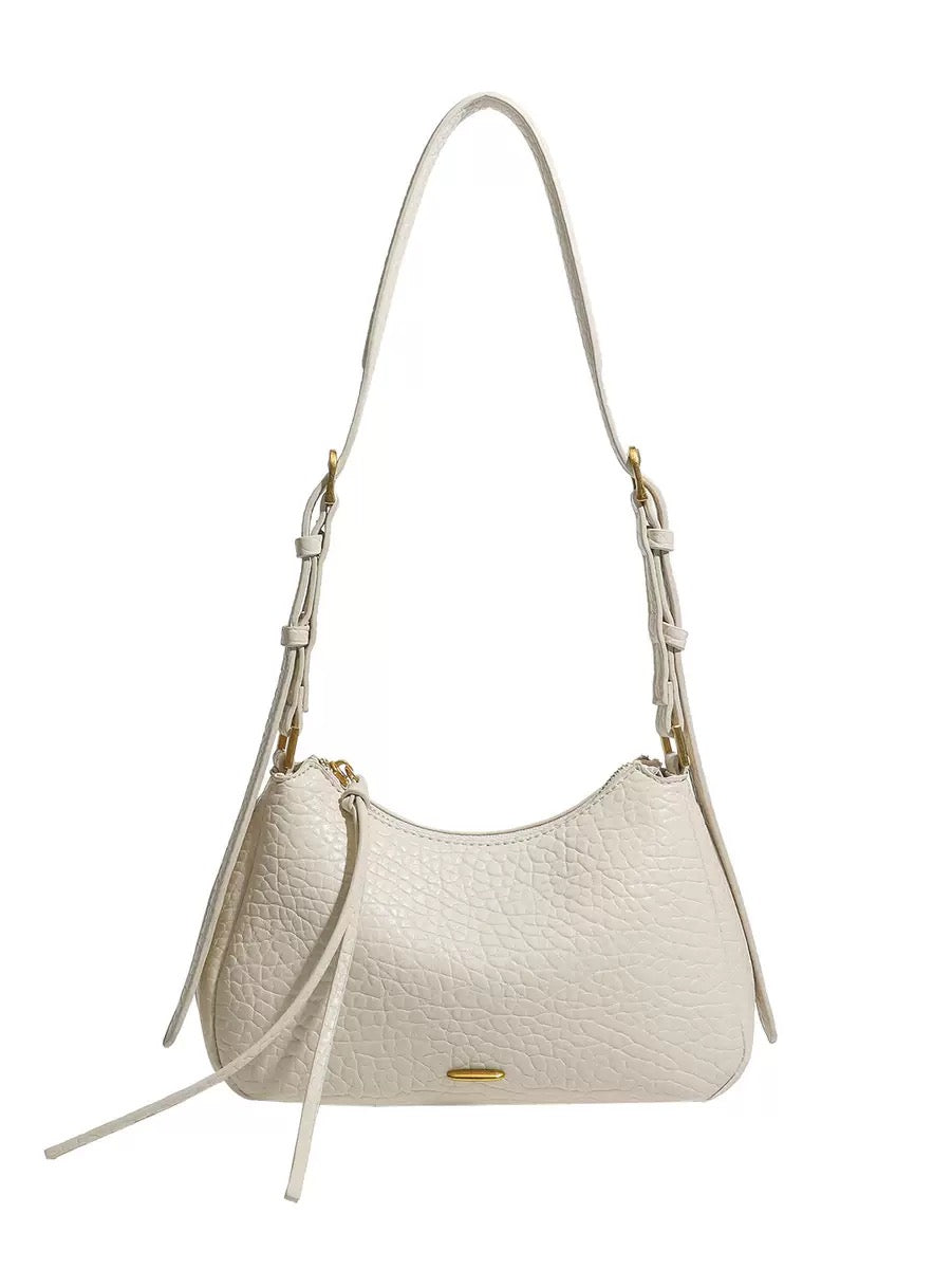 Spring 2026 Relaxed Simple Hobo – The Effortless Petite Underarm Bag  Best for: High-end boutiques or brand websites where a clean, sophisticated look is preferred over keyword-heavy descriptions