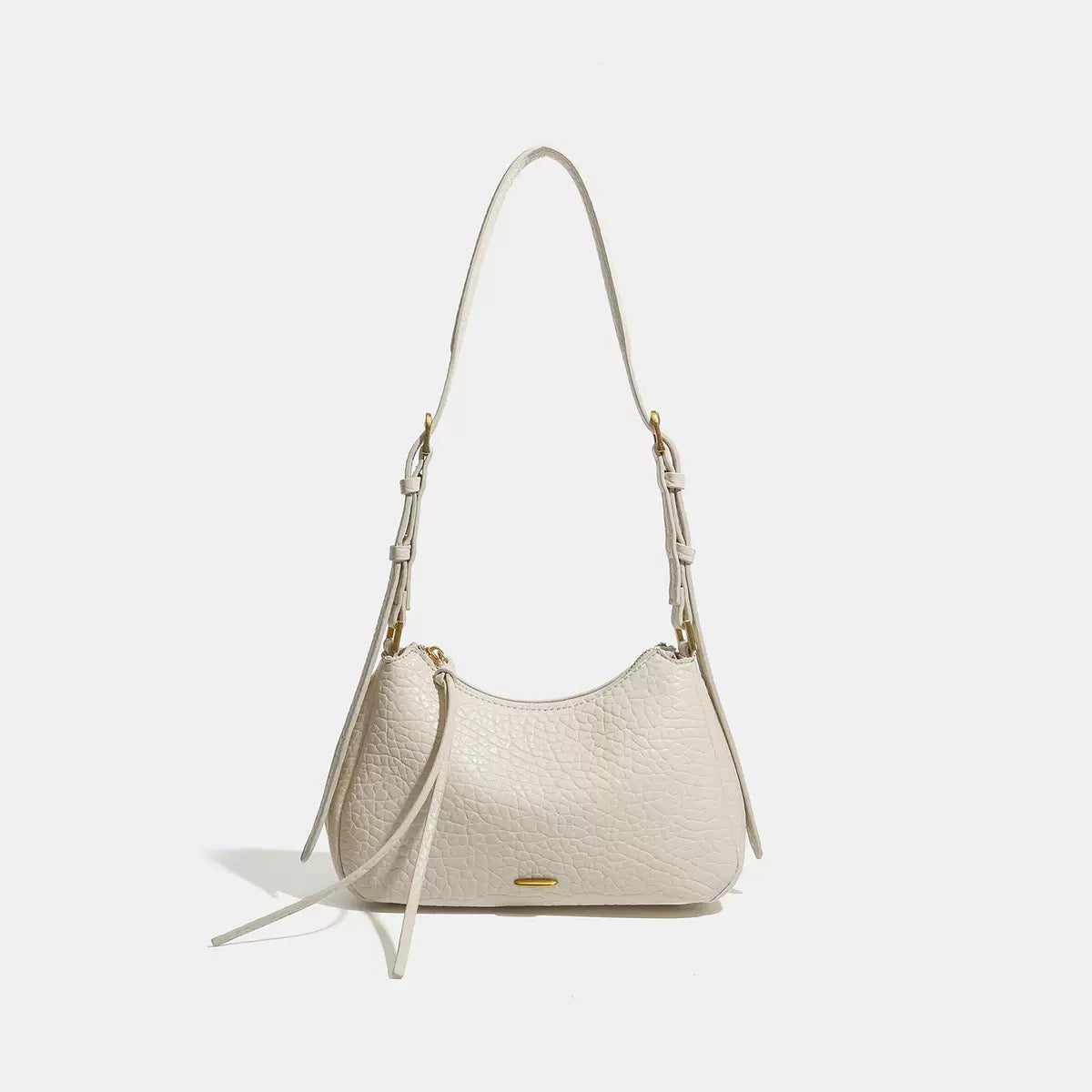 Spring 2026 Relaxed Simple Hobo – The Effortless Petite Underarm Bag  Best for: High-end boutiques or brand websites where a clean, sophisticated look is preferred over keyword-heavy descriptions